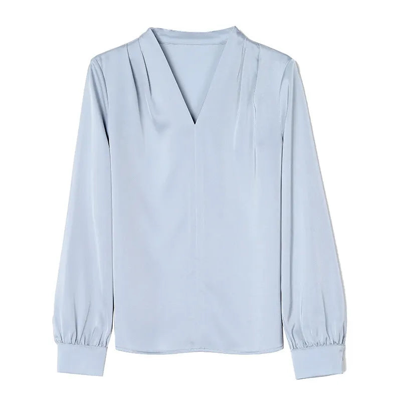Blue slim fit long sleeve women's satin shirt with 3D stitching on a hanger.