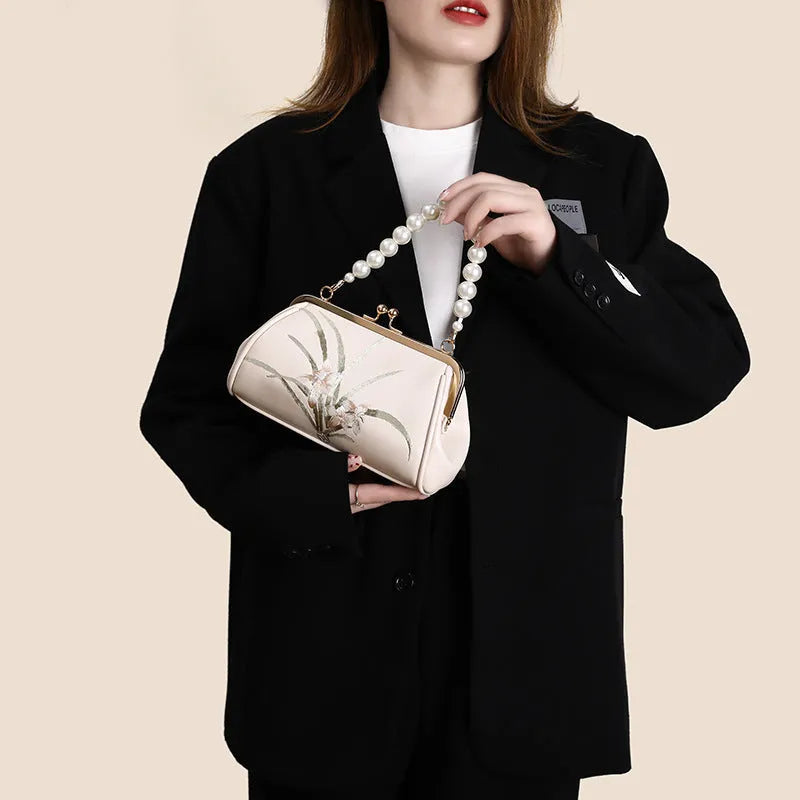 Beige embroidered shell-shaped women's shoulder bag in soft PU leather