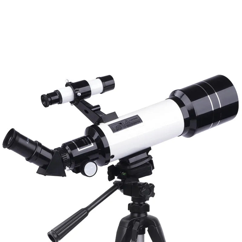 Dark blue children's astronomical monocular telescope on a tripod for stargazing.