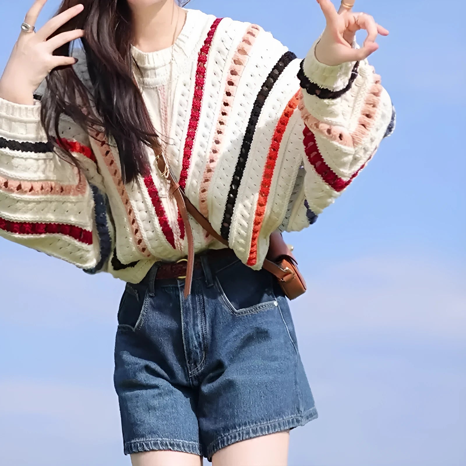 Rainbow striped hollow knit sweater with batwing sleeves in retro chic design