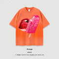 Heavy washed cotton loose fit short sleeve t-shirt with cartoon graphic print on front.