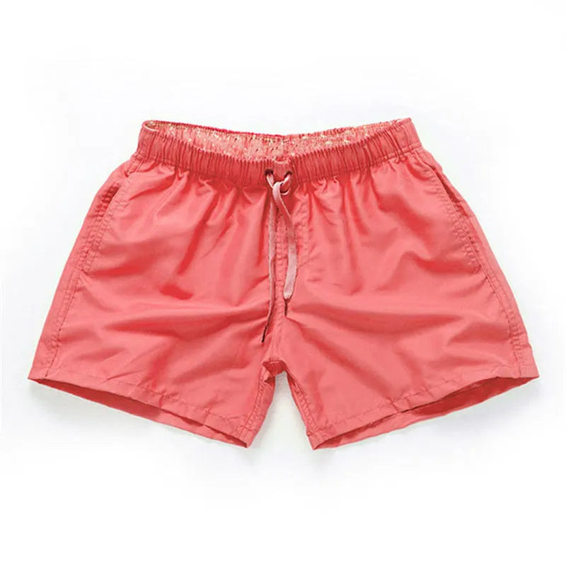 Men's plus size polyester beach shorts in black, showing straight leg opening.