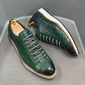 Men's low tube casual shoes with an embossed pattern on the upper and front tie laces.