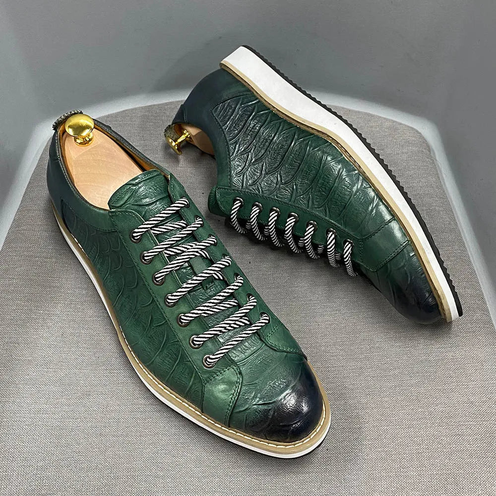 Men's low tube casual shoes with an embossed pattern on the upper and front tie laces.