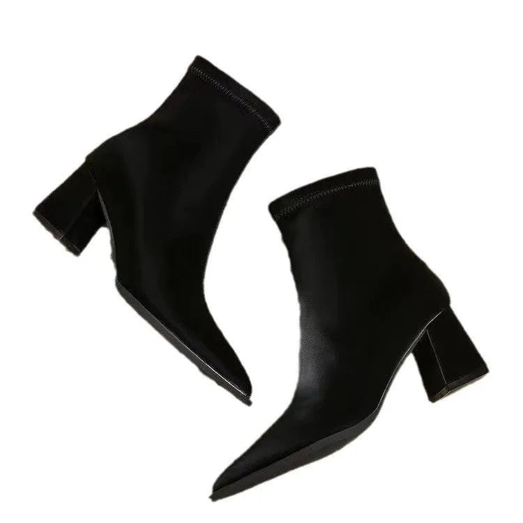 Women's khaki pointed toe Martin boots with a wedge heel and stretch artificial velboa upper.
