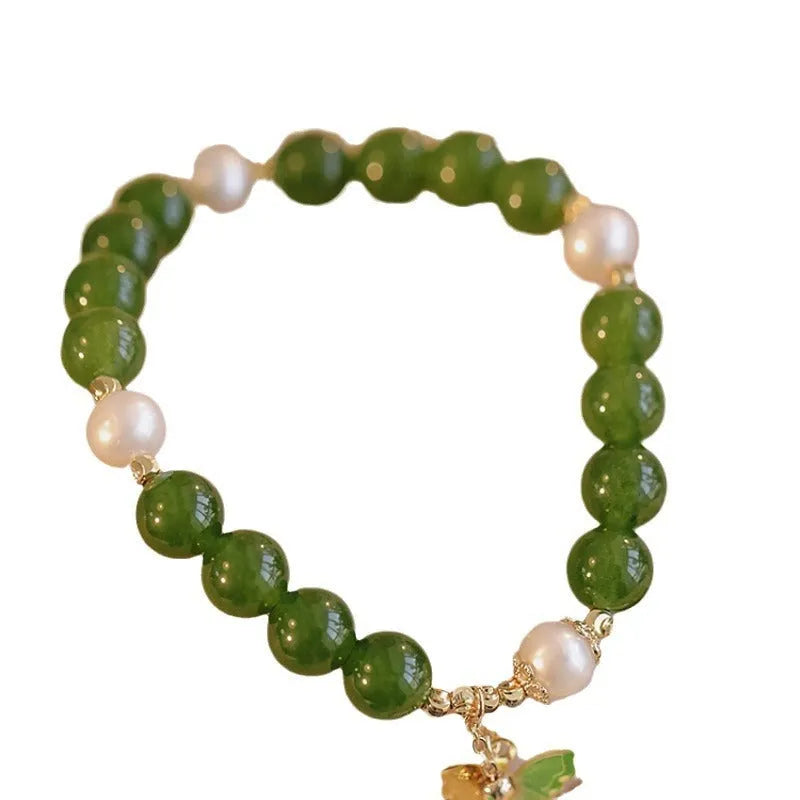 Women's natural green chalcedony bracelet with geometric design and round elements