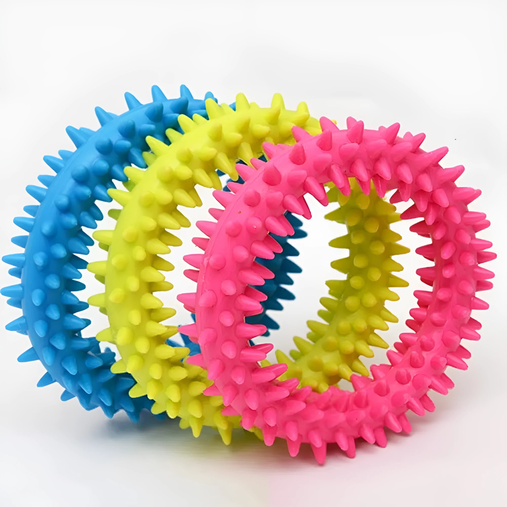 Blue spiky circle ring dog chew toy made of TPR for bite training and dental cleaning.