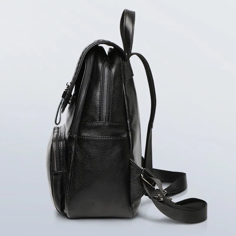 Solid colour genuine leather women's backpack showing internal organisation compartments