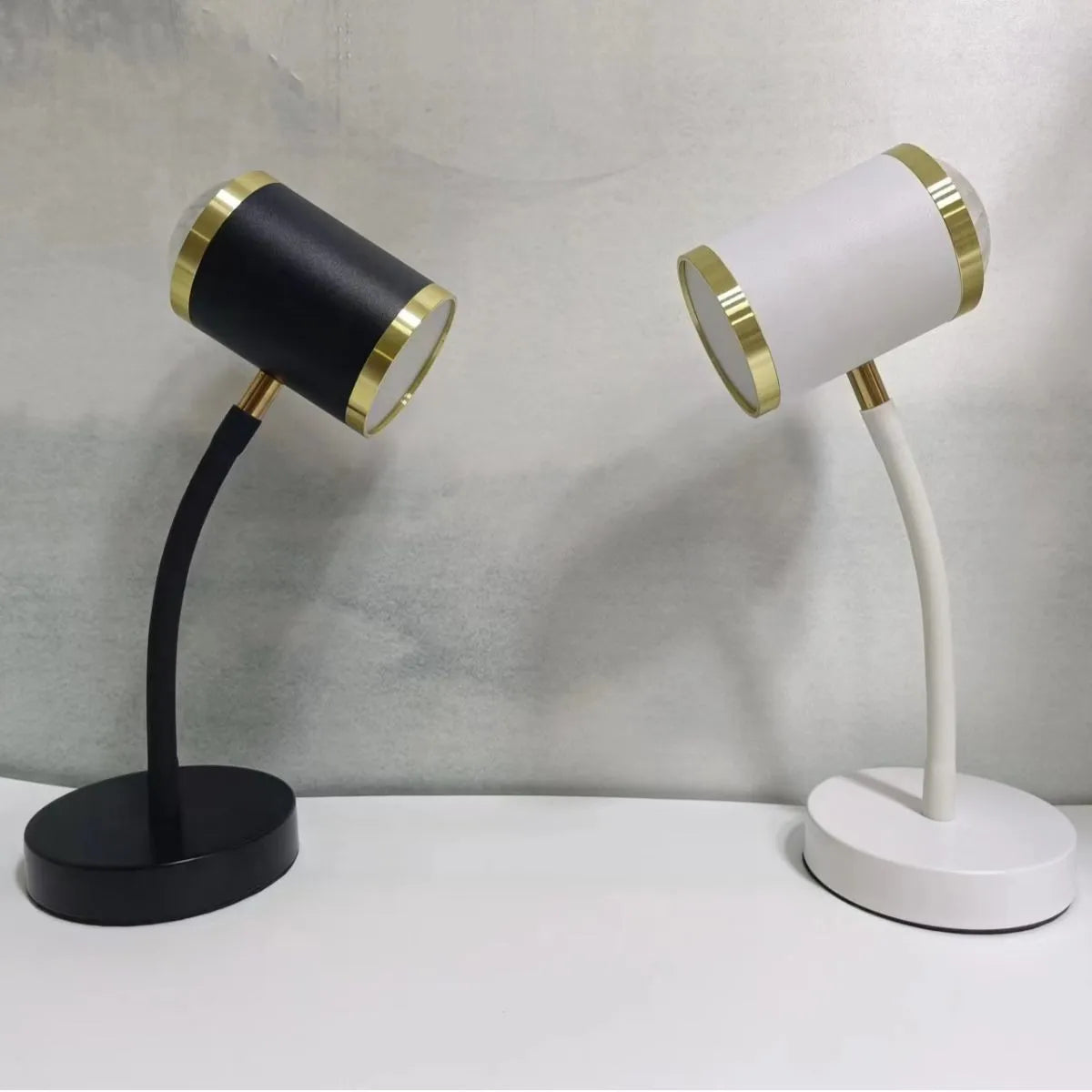 Black and white double-headed metal studio lamp for live streaming and photography.