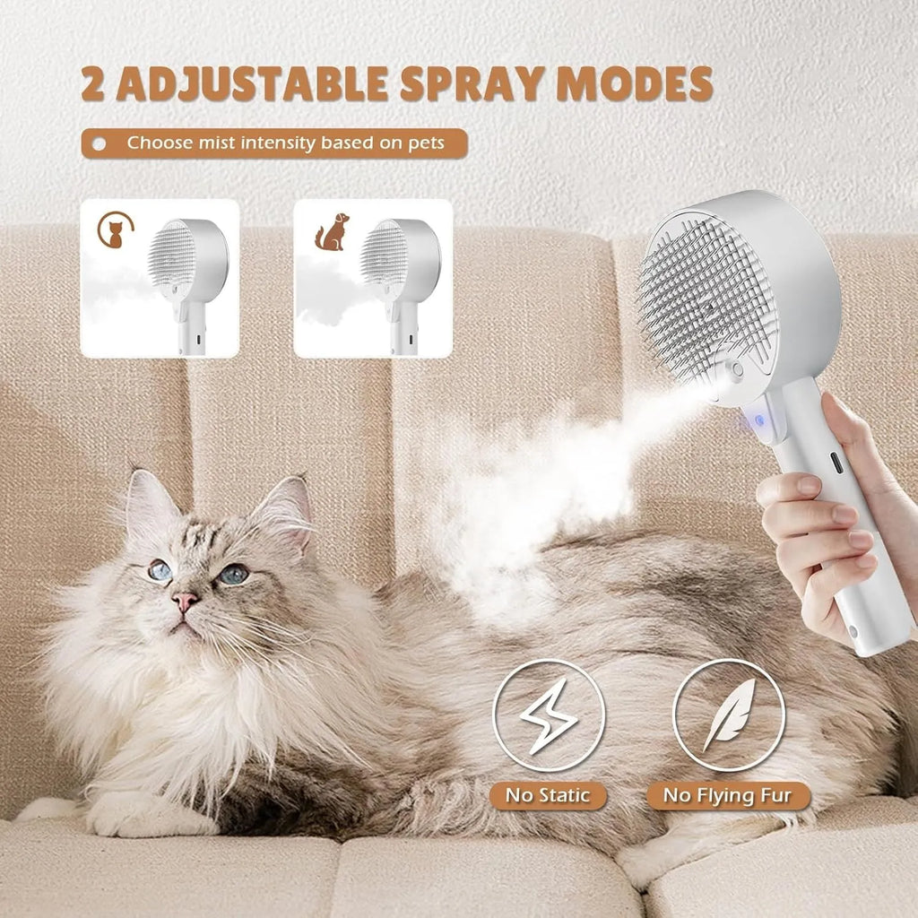 Pink and white cat grooming brush with mist spray function and stainless steel comb