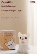Cartoon animal silicone USB night light with dimmer switch on a bedside table.