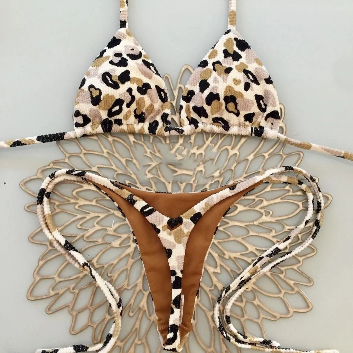 Women's printed bikini swimsuit with quick-dry fabric shown in available colours