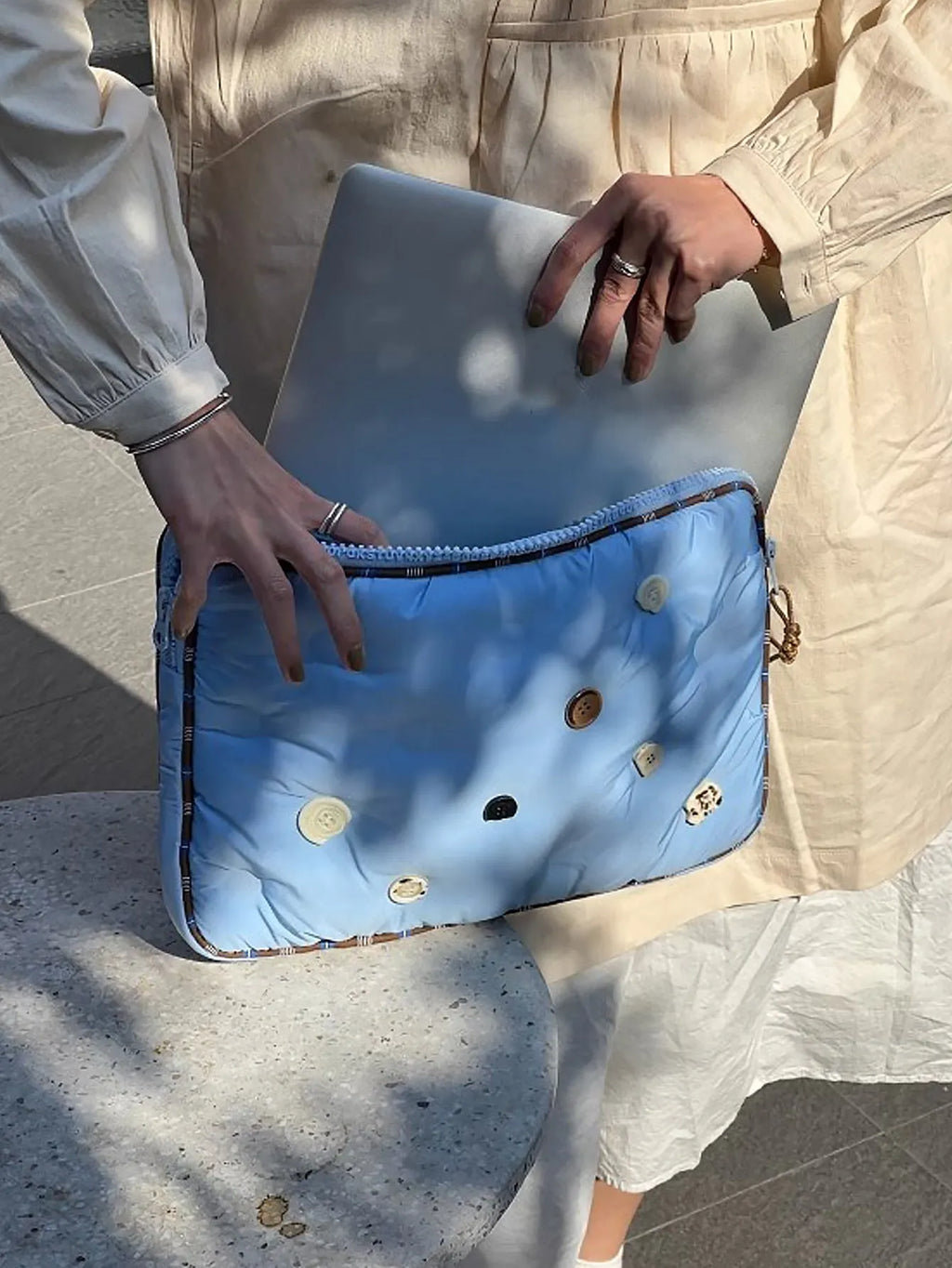 Blue and citrus plaid patterned nylon laptop sleeve for a 14-inch computer