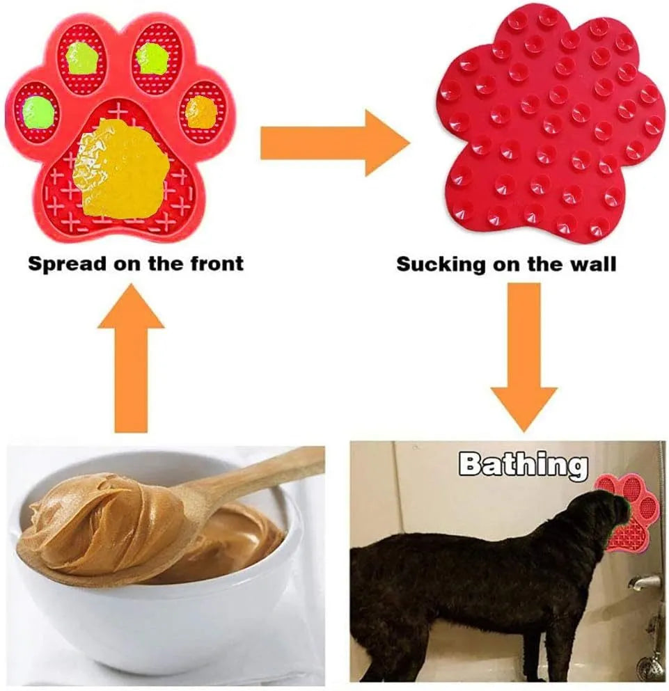 Blue bone-shaped silicone dog licking mat with suction cups on the back, placed on a tiled wall.