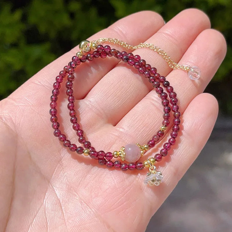 Women's natural garnet bracelet with double ring design and H311 colour stones