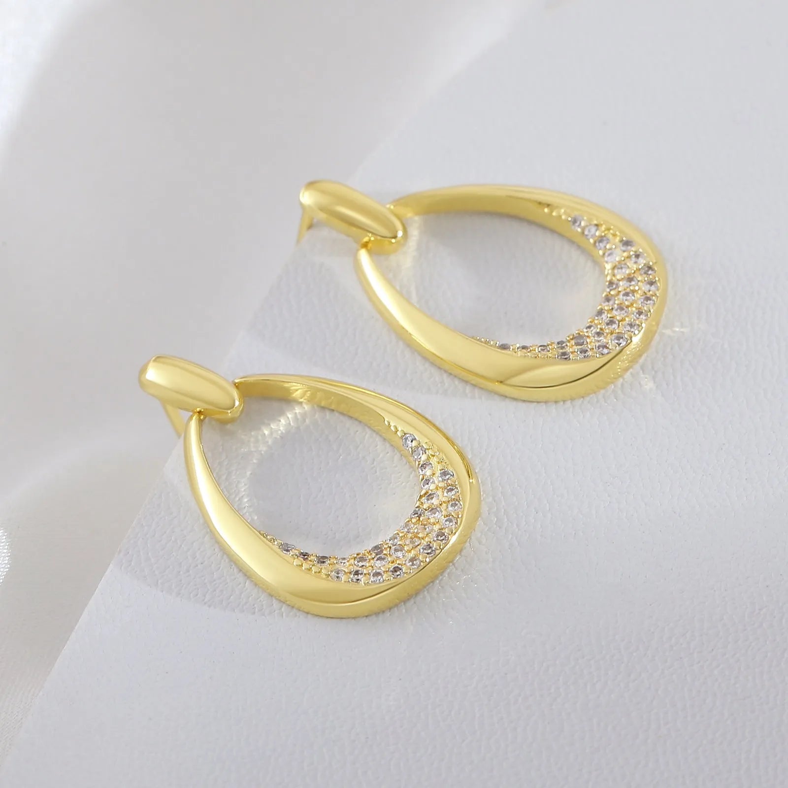 Yellow gold geometric drop earrings for women with ring design, dimensions 2.6cm by 1.7cm.
