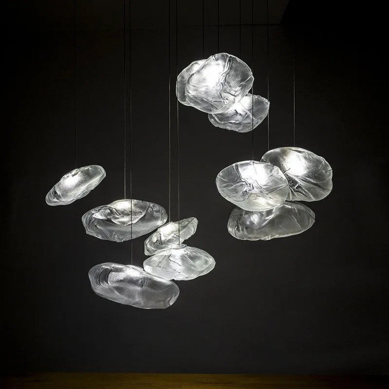 Modern fabric chandelier with glass shade in clear, amber, or smoke grey colour options.