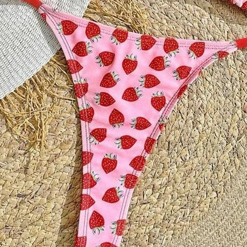 Women's pink strawberry print lace-up triangle bikini set with polyester-nylon fabric for swimming