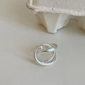 Three-dimensional interlaced matte metal open ring with geometric design in gold or silver electroplated finish