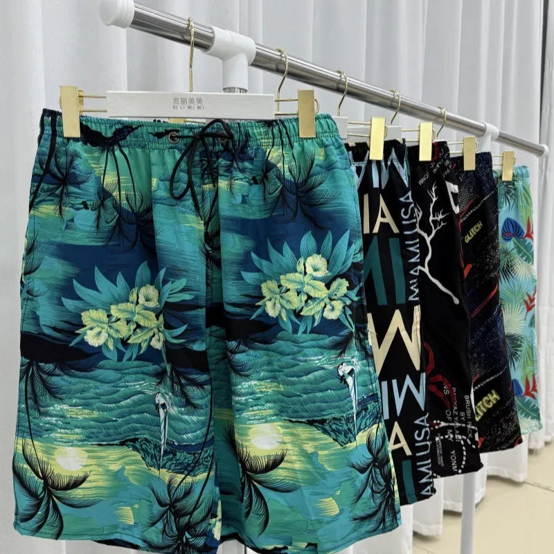 Men's loose fit beach pants in ice silk polyester blend fabric with stripe or floral patterns