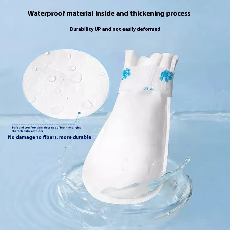 A pack of 20 white disposable non-woven fabric shoe covers for small or medium dogs on a blue background.