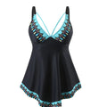 Plus size green two-piece bikini swimsuit with briefs on a mannequin.