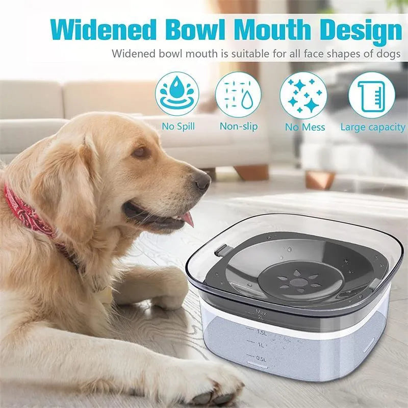 Transparent large 2-litre dog water bowl with floating slow drink disc on a non-slip base.