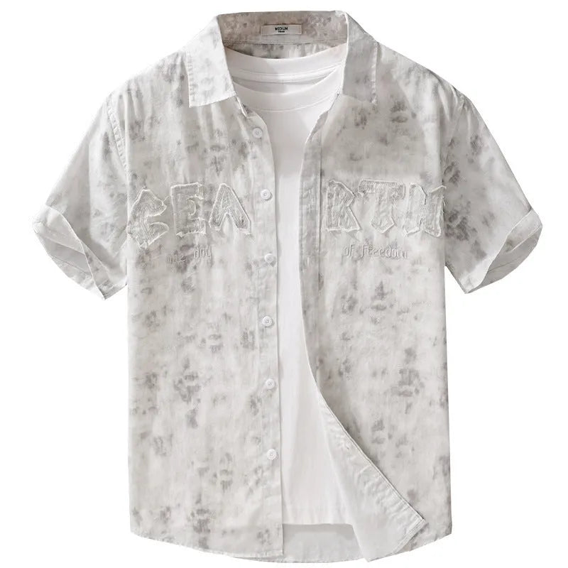 Men's light pink hanging dyed printed short sleeve cotton cardigan with loose fit on hanger