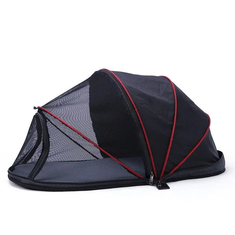 Portable folding cat tent with half-mesh side in blue, set up on a floor.