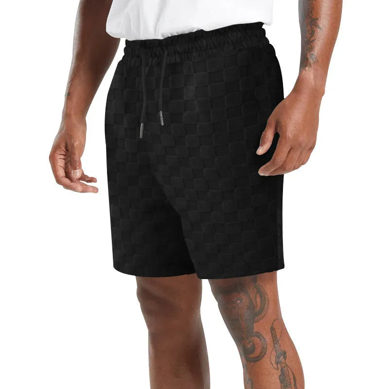 Checkerboard plaid sports shorts with loose fit and straight-leg design in four colour options