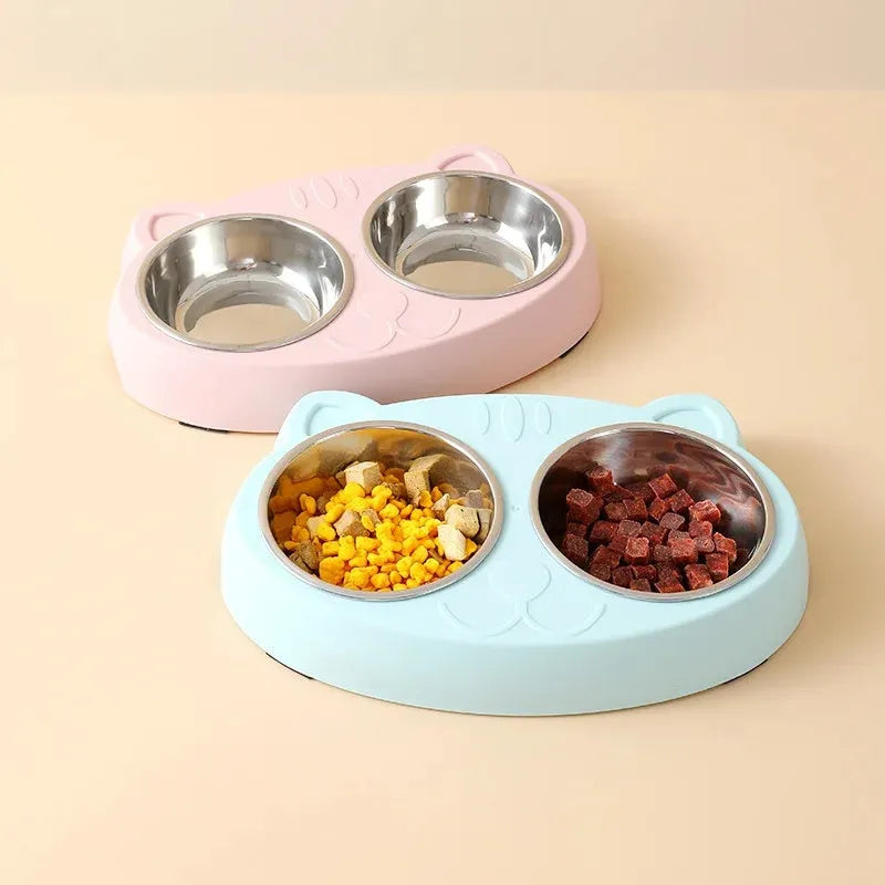 Macaron coloured plastic pet feeder tray with two bowls and a non-slip base.
