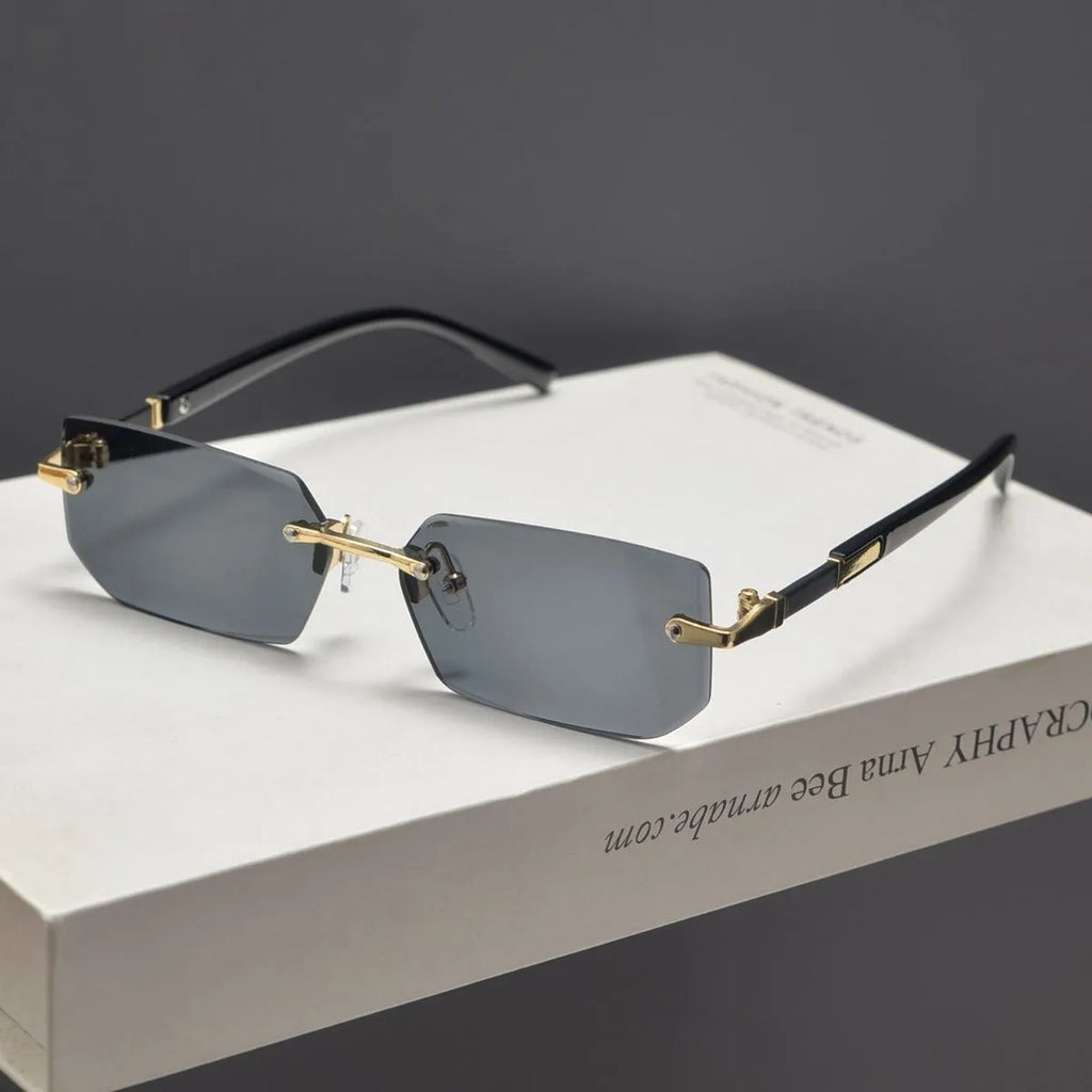 Unisex frameless water drop sunglasses in black, transparent, gold and gradient grey for sun protection and outdoor wear