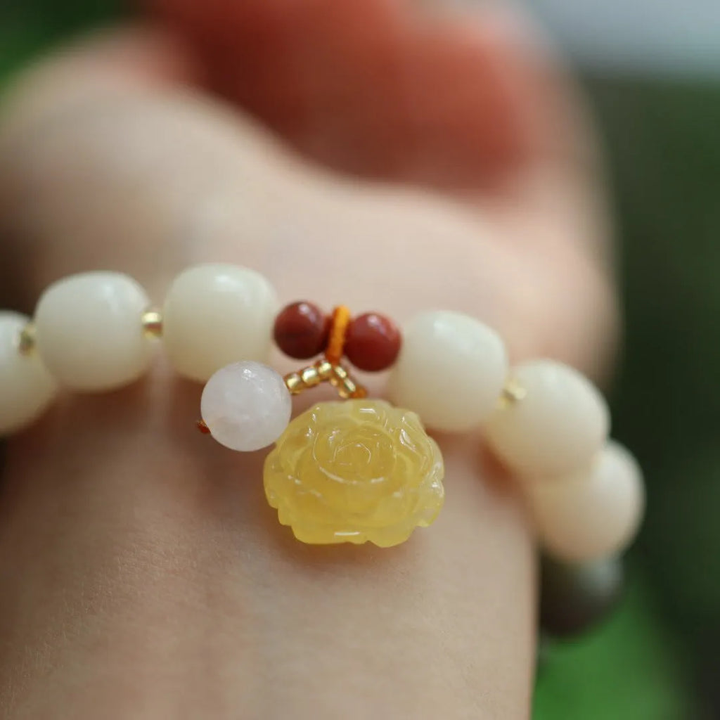 Woven Bodhi root bracelet with gradient white jade colour and natural beeswax Lotus elements, 10mm floral retro design.