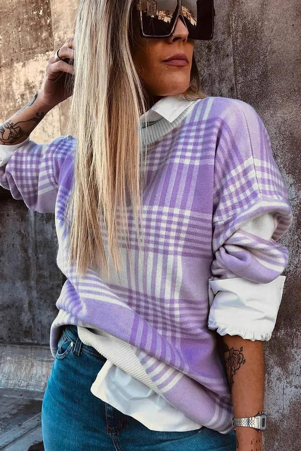 Lilac plaid print loose sweater with long sleeves and ribbed cuffs.