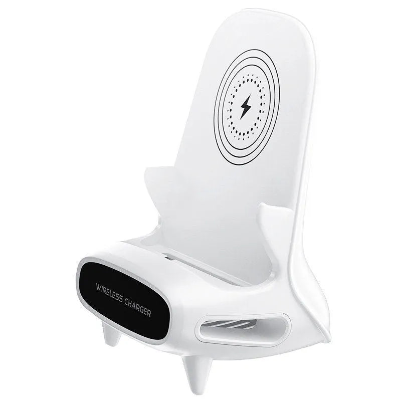 White mini chair-shaped wireless phone charger and holder on a desk
