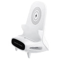 White mini chair-shaped wireless phone charger and holder on a desk