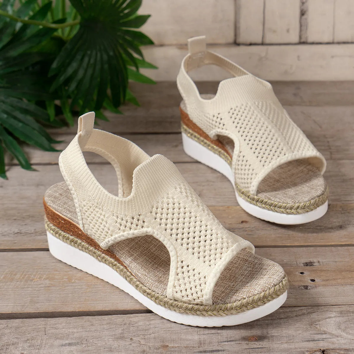 Women's hollow wedge peep-toe sandals in beige with patent leather upper and breathable mesh, side view