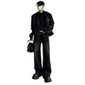 Mens washed black straight leg denim jeans with dirty mud texture and zip fly