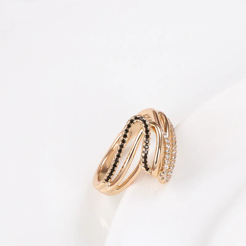 Close-up of a women's copper ring with micro-inlaid zircon stones and an electroplated finish.