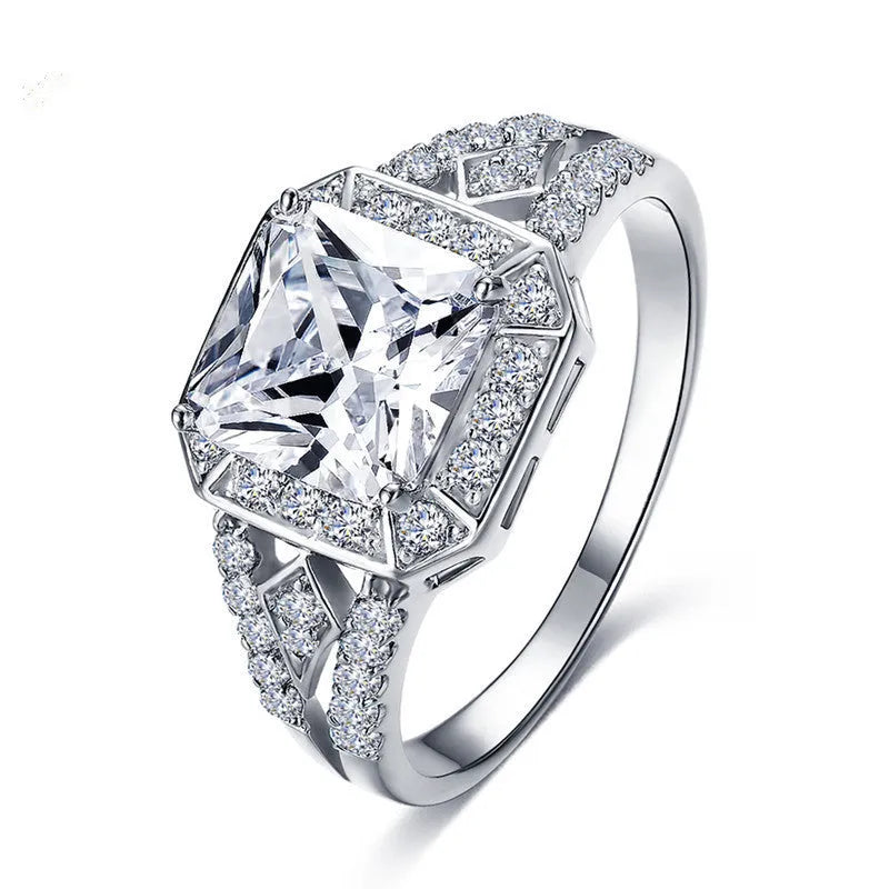 Geometric hollow women's ring with quadrilateral pattern and zircon stones in platinum finish
