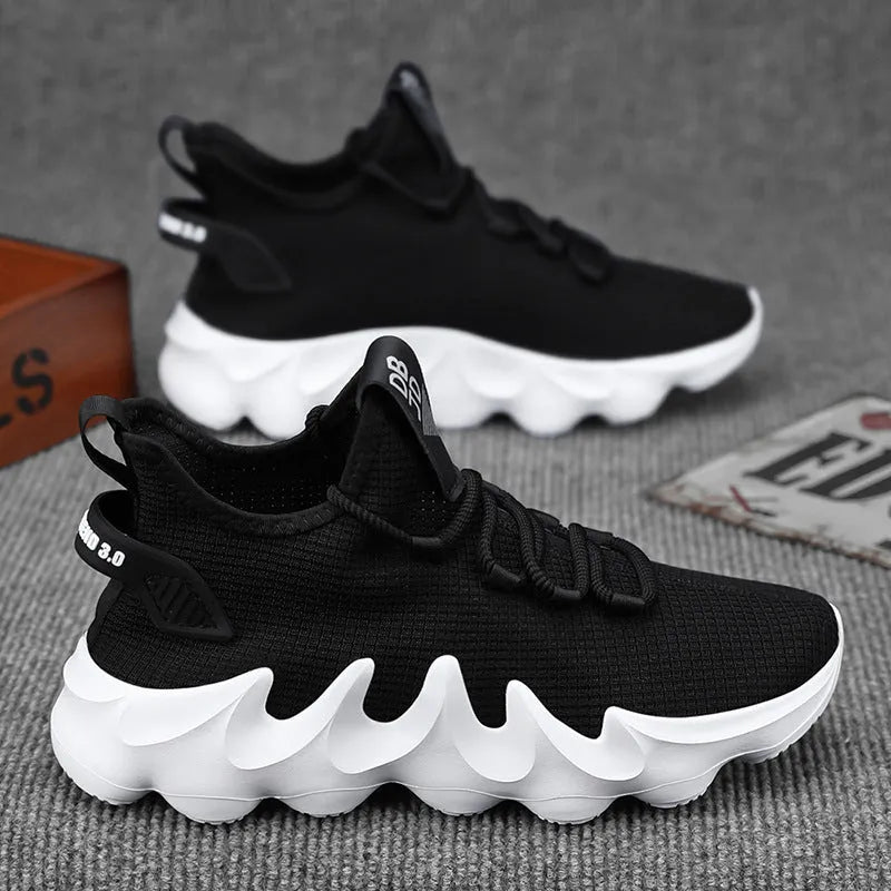 Men's black lightweight sock-like sports shoes with flat rubber sole and lace-up front.