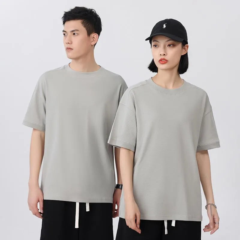 Breathable cotton pique short-sleeved T-shirt in loose fit showing solid colour option