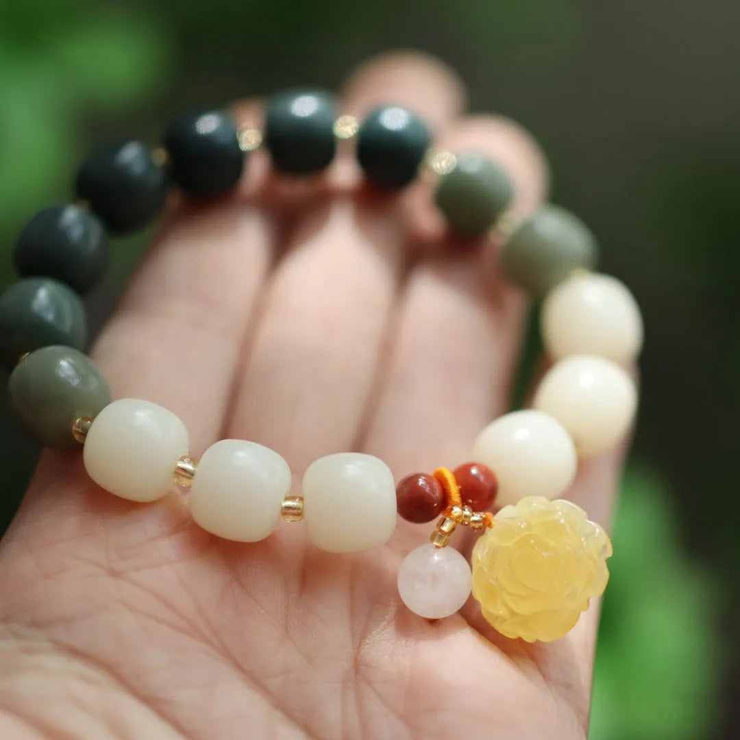 Woven Bodhi root bracelet with gradient white jade colour and natural beeswax Lotus elements, 10mm floral retro design.