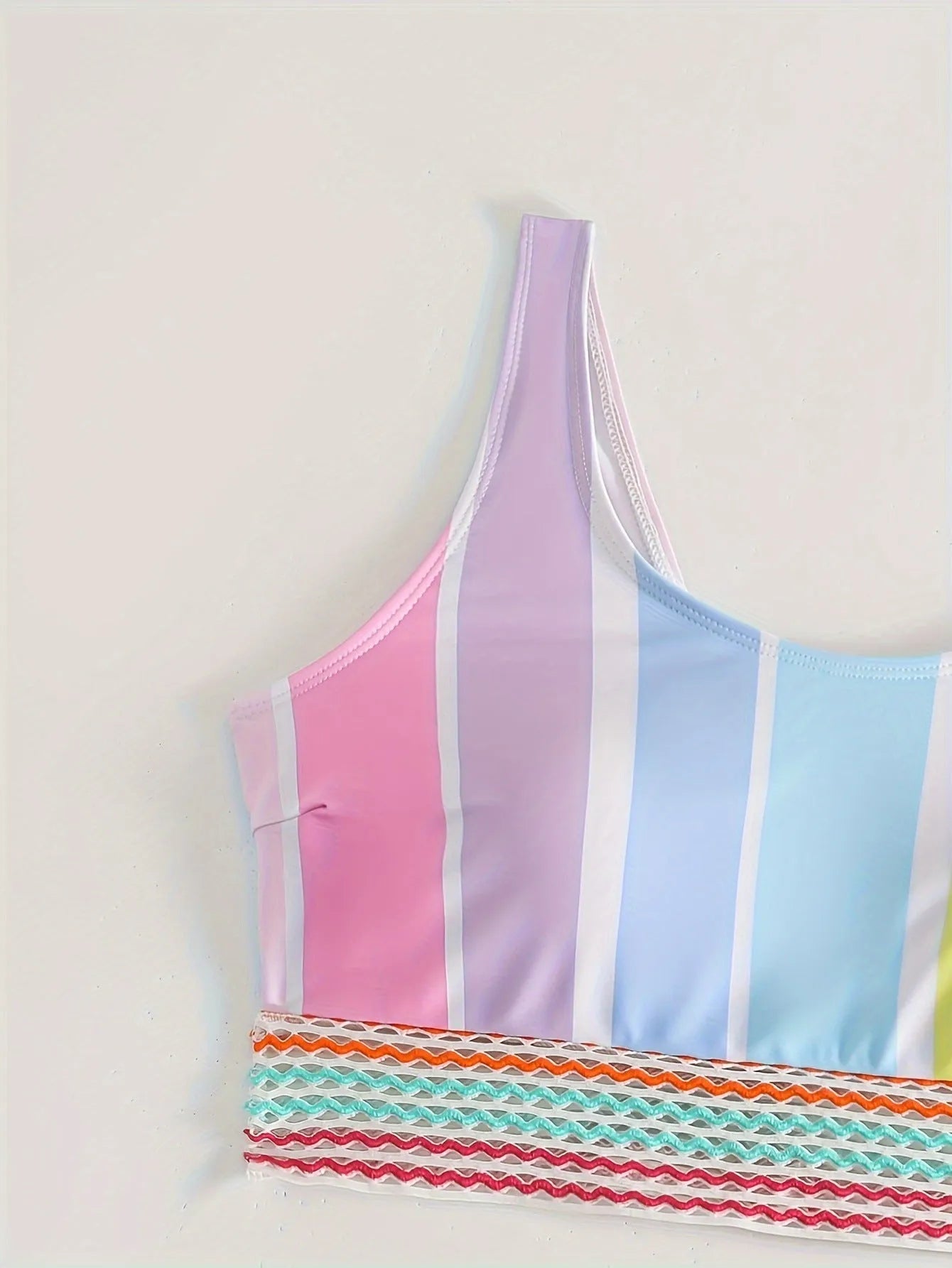 Women's striped two-piece bikini set for swimming and sports.