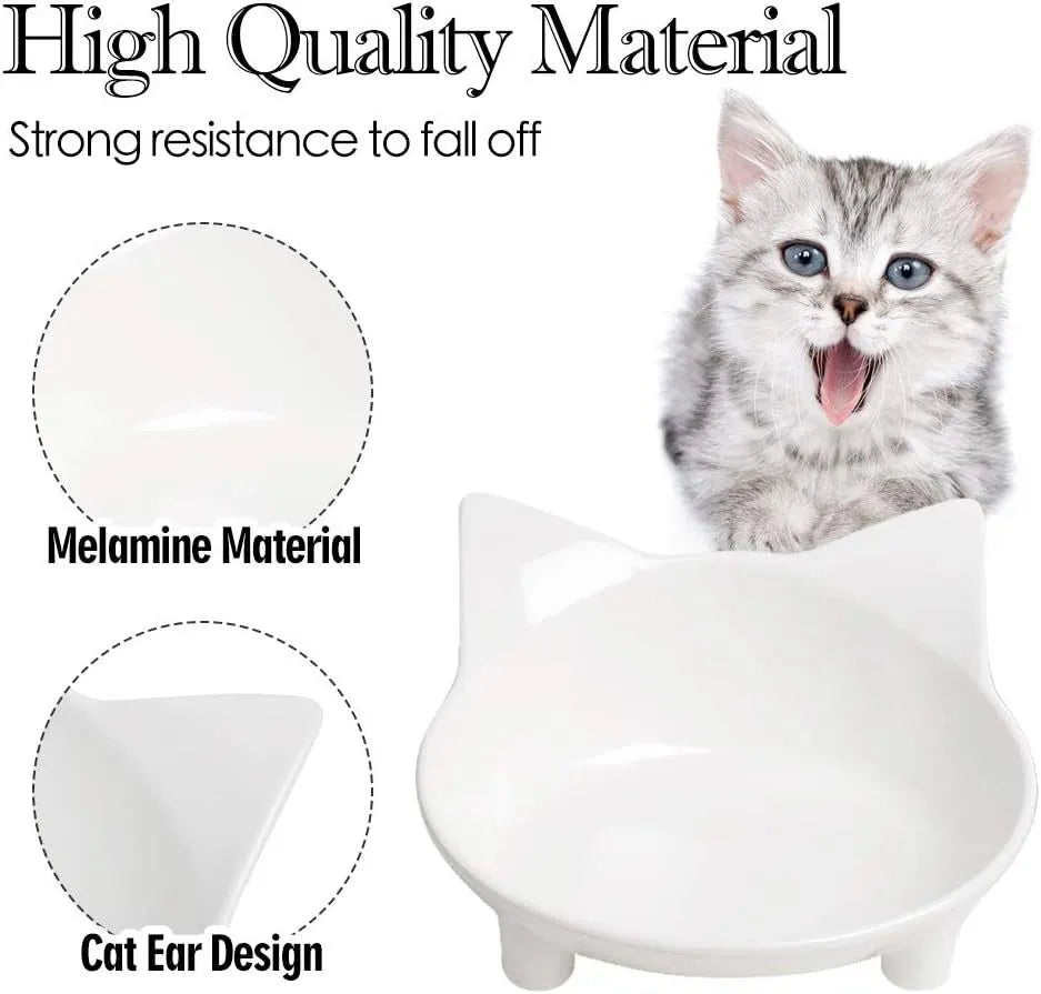 White shallow melamine cat bowl with non-slip rubber base on a table.