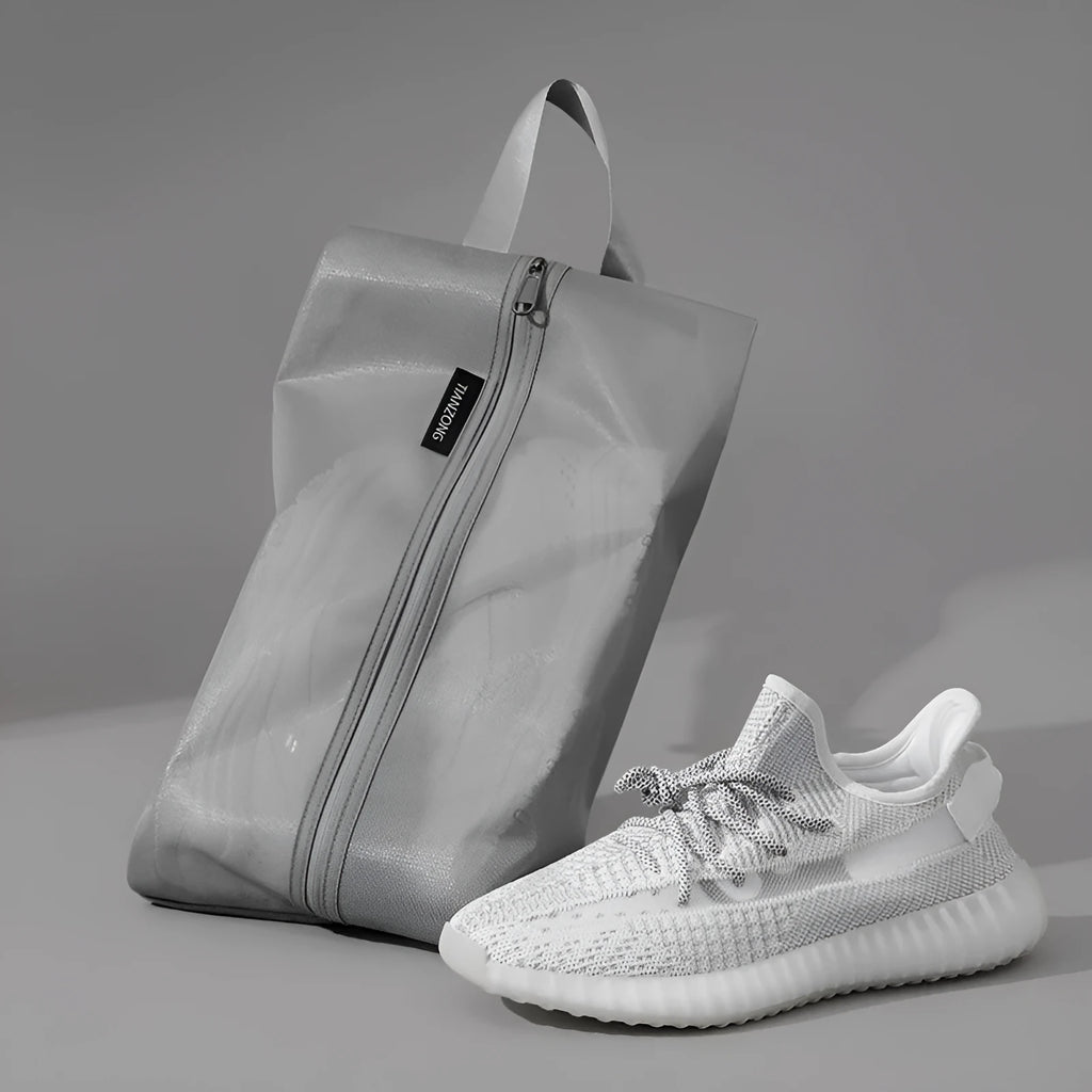 Travel shoes buggy dustproof storage bag in beige, made from TPU protective film, large size 40x22cm.