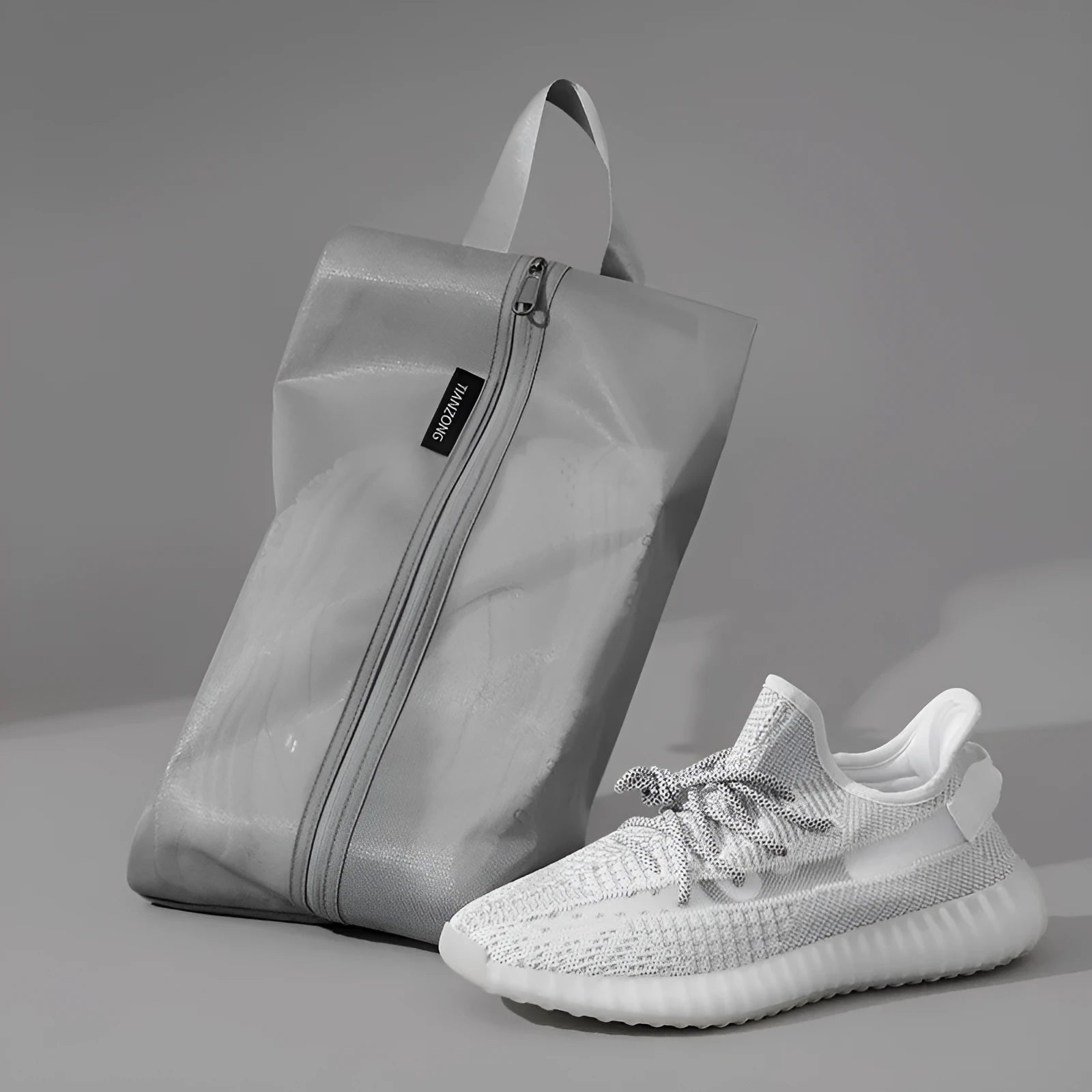 Travel shoes buggy dustproof storage bag in beige, made from TPU protective film, large size 40x22cm.