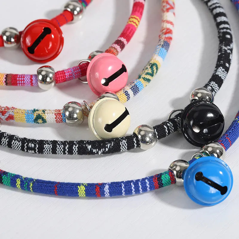 Ethnic style pet collar with bell in multiple colours showing adjustable fastening