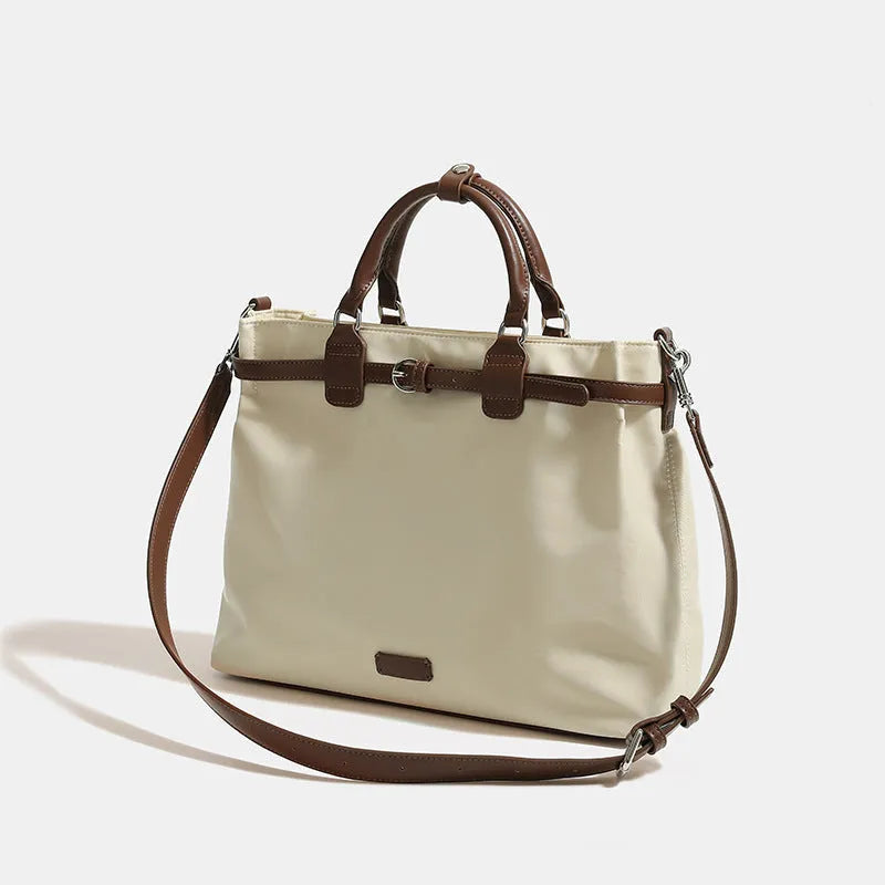 Women's nylon shoulder tote bag in creamy-white colour showing internal compartments and three shoulder straps