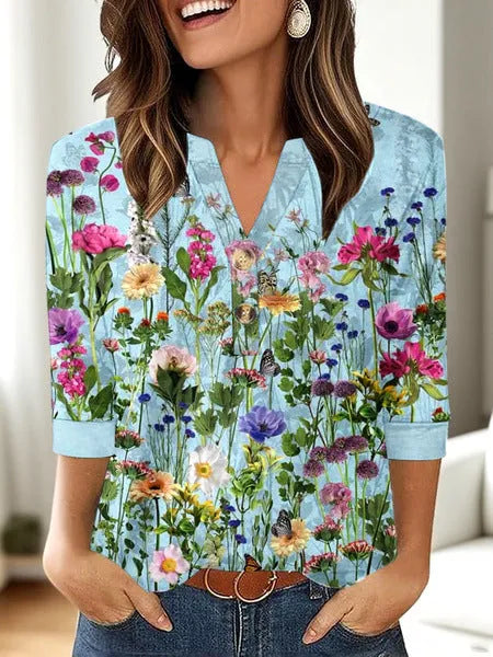 Women's loose-fit casual V-neck t-shirt with a 3D effect printed pattern.